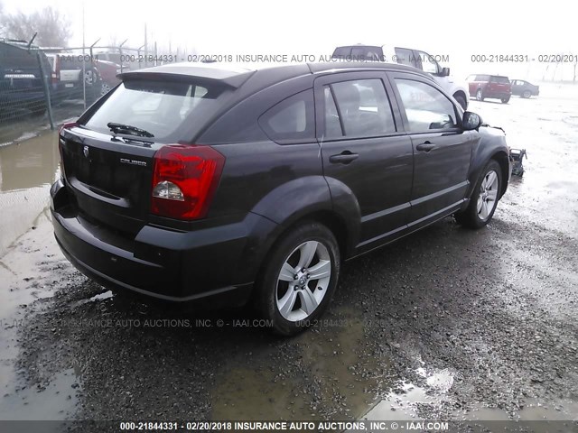 1B3CB3HA3BD113587 - 2011 DODGE CALIBER MAINSTREET BLACK photo 4