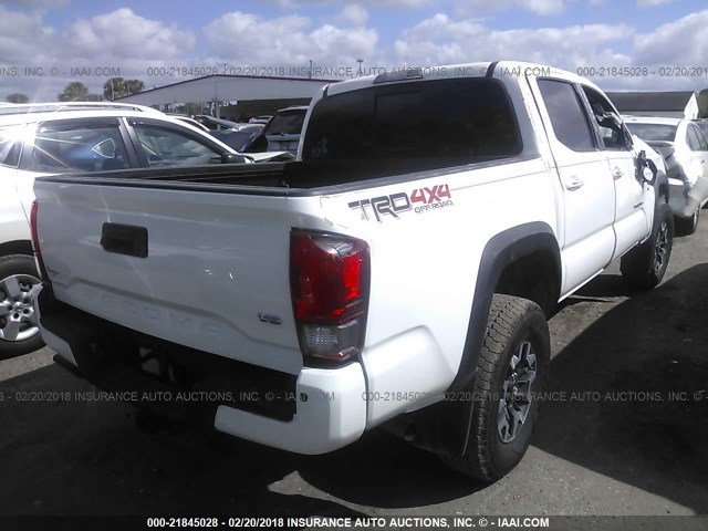 5TFCZ5AN3HX063817 - 2017 TOYOTA TACOMA DBL CAB/SR/TRDSPT/OR/PRO თეთრი ფოტო 4