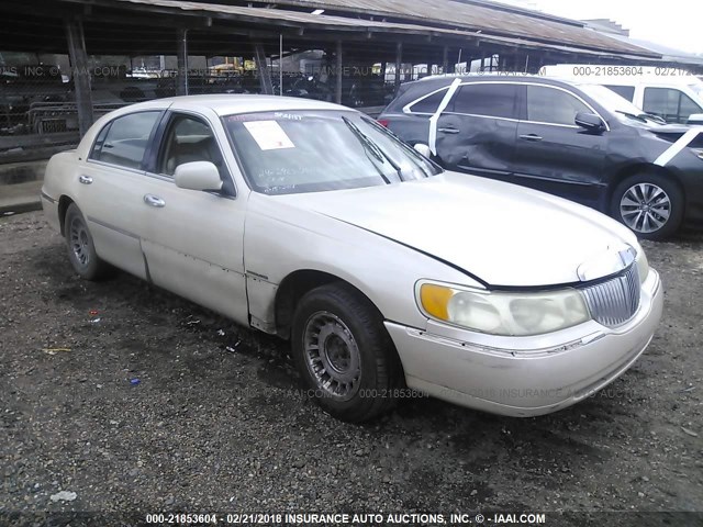 1LNHM83W7XY624553 - 1999 LINCOLN TOWN CAR CARTIER BEIGE photo 1