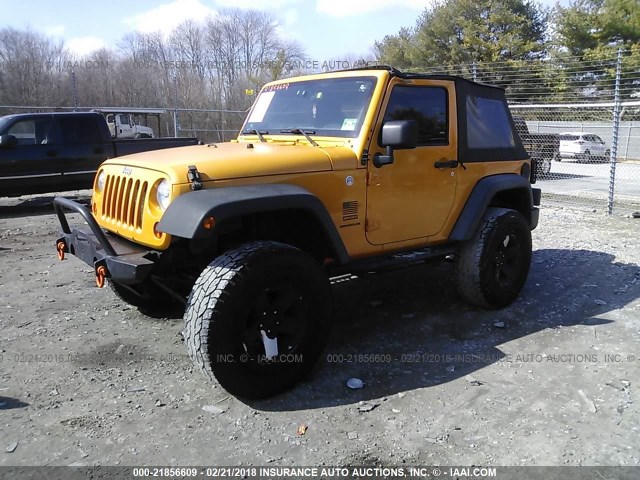 1C4AJWAG1CL147592 - 2012 JEEP WRANGLER SPORT ORANGE photo 2