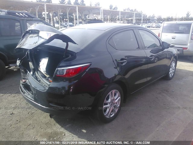 3MYDLBZV4GY133056 - 2016 TOYOTA SCION IA BLACK photo 4