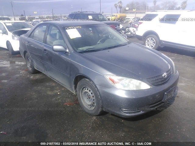 JTDBE32K230191063 - 2003 TOYOTA CAMRY LE/XLE رمادي صورة 1