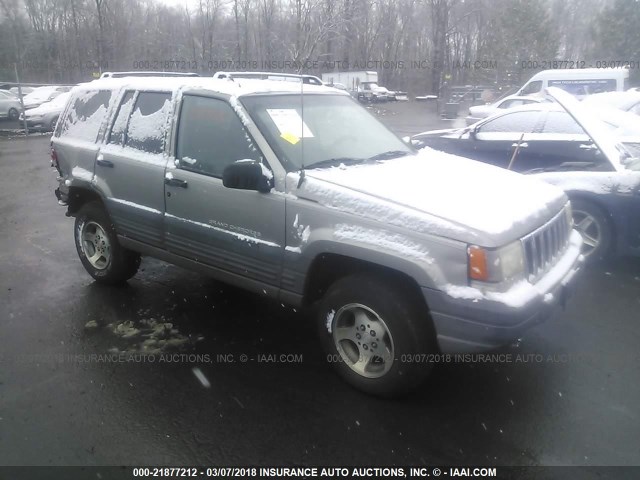 1J4GZ58S0VC734645 - 1997 JEEP GRAND CHEROKEE LAREDO/TSI GRAY photo 1