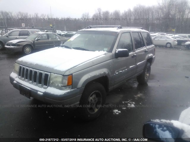 1J4GZ58S0VC734645 - 1997 JEEP GRAND CHEROKEE LAREDO/TSI GRAY photo 2