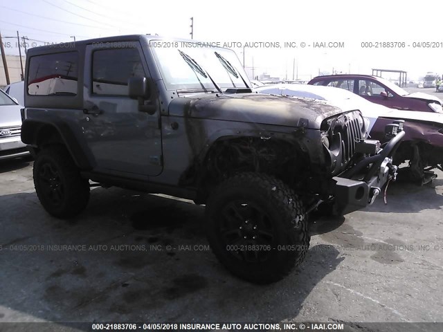 1C4AJWAG8FL604015 - 2015 JEEP WRANGLER SPORT رمادي صورة 1