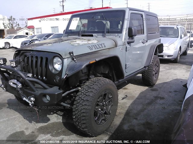 1C4AJWAG8FL604015 - 2015 JEEP WRANGLER SPORT رمادي صورة 2