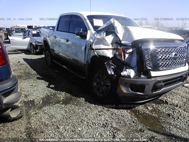 1N6AA1E56HN566798 - 2017 NISSAN TITAN SV/SL/PRO-4X/PLAT RES WHITE photo 1