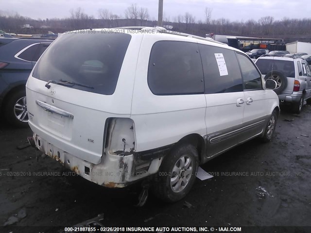 KNDUP132056700623 - 2005 KIA SEDONA EX/LX WHITE photo 4