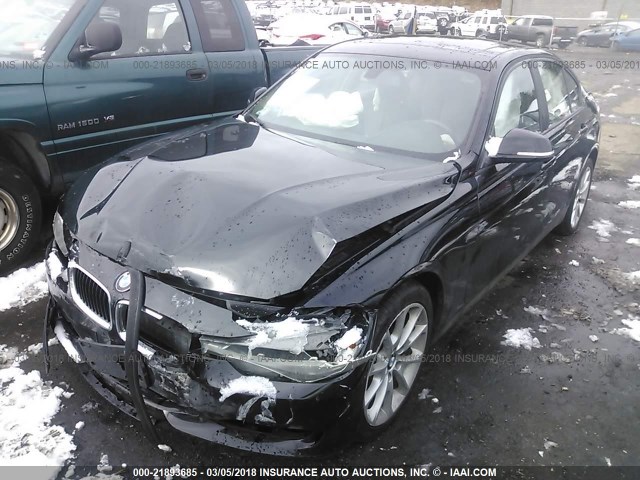 WBA3C3C52DF980585 - 2013 BMW 320 I/XDRIVE BLACK photo 2