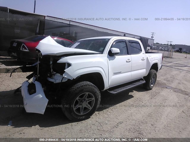 5TFDZ5BN4GX011825 - 2016 TOYOTA TACOMA DBL CAB/SR5/TRD SPORT/OR WHITE photo 2