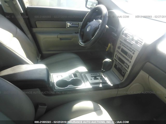 1LNHM87A63Y666351 - 2003 LINCOLN LS Light Blue photo 5