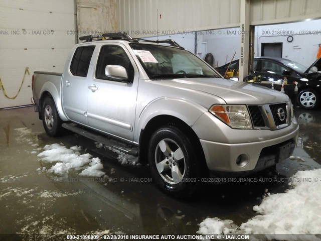 1N6AD07U55C461716 - 2005 NISSAN FRONTIER CREW CAB LE/SE/OFF ROAD SILVER photo 1