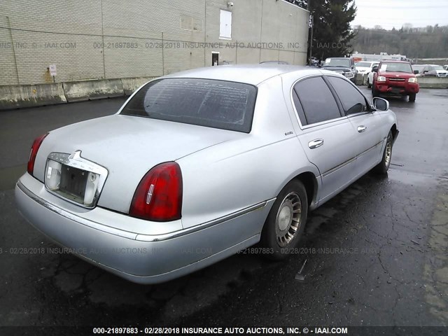 1LNHM81W1YY791589 - 2000 LINCOLN TOWN CAR EXECUTIVE SILVER photo 4