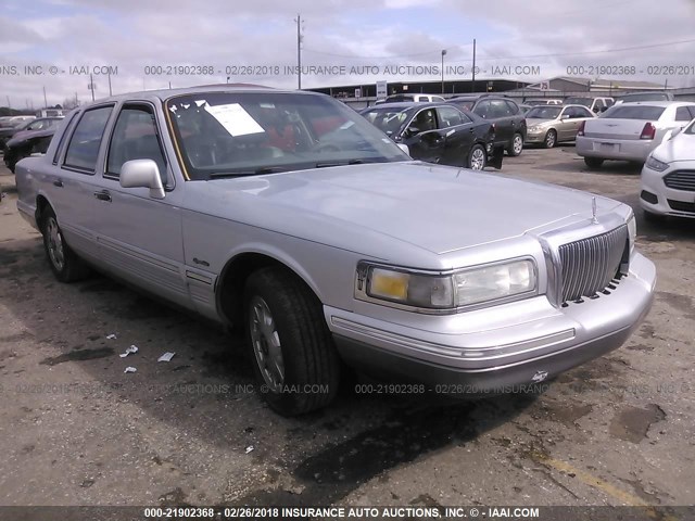 1LNLM82W2VY726321 - 1997 LINCOLN TOWN CAR SIGNATURE/TOURING SILVER photo 1