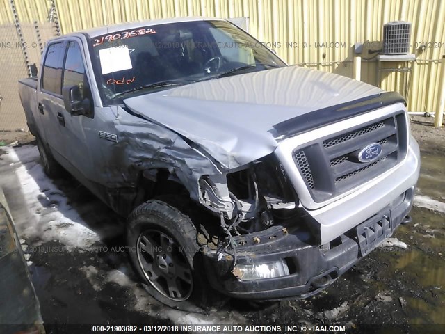 1FTPW14594KC06694 - 2004 FORD F150 SUPERCREW BLACK photo 1