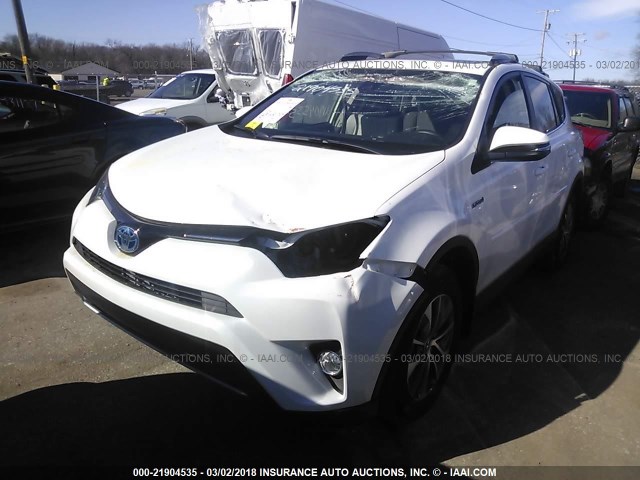 JTMRJREV0HD150868 - 2017 TOYOTA RAV4 HV LE/XLE WHITE photo 2