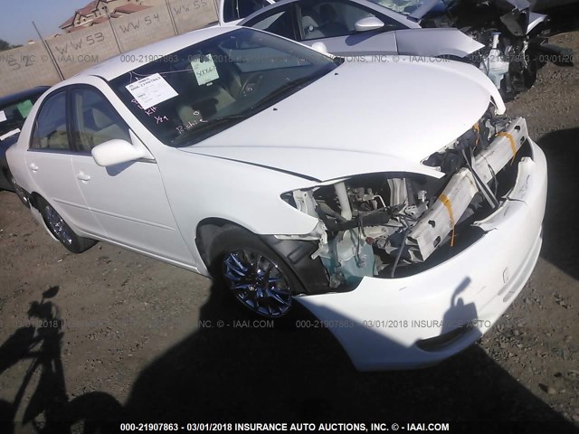 JTDBE32K930165768 - 2003 TOYOTA CAMRY LE/XLE WHITE photo 1