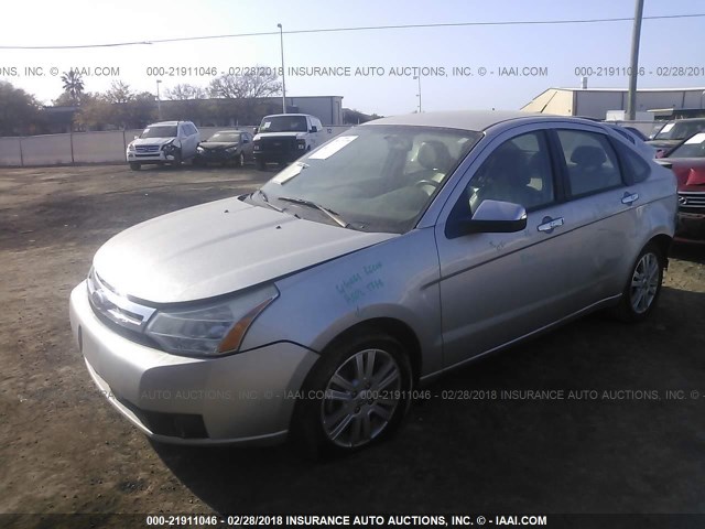 1FAHP3HNXAW177370 - 2010 FORD FOCUS SEL SILVER photo 2