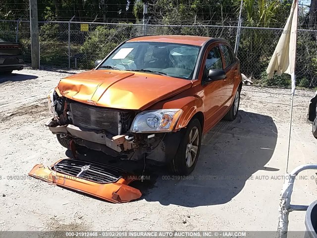 1B3CB3HA8BD242473 - 2011 DODGE CALIBER MAINSTREET ORANGE photo 2