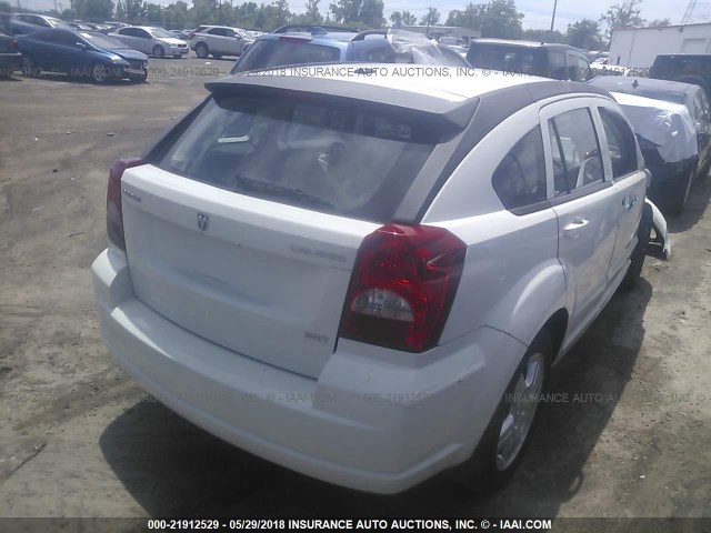 1B3HB48A79D123304 - 2009 DODGE CALIBER SXT WHITE photo 4