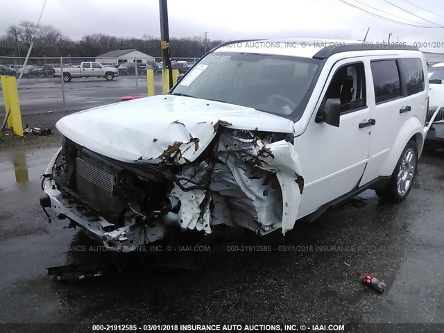 1D4PU4GK9BW606045 - 2011 DODGE NITRO HEAT WHITE photo 2