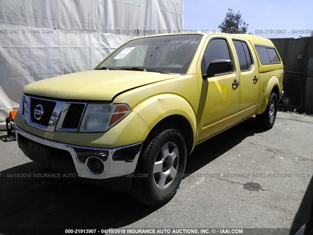 1N6AD09UX7C415198 - 2007 NISSAN FRONTIER CREW CAB LE/SE/OFF ROAD YELLOW photo 2