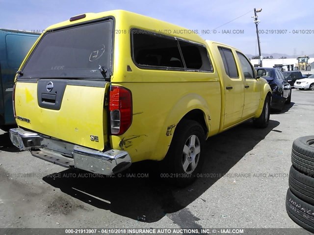 1N6AD09UX7C415198 - 2007 NISSAN FRONTIER CREW CAB LE/SE/OFF ROAD YELLOW photo 4