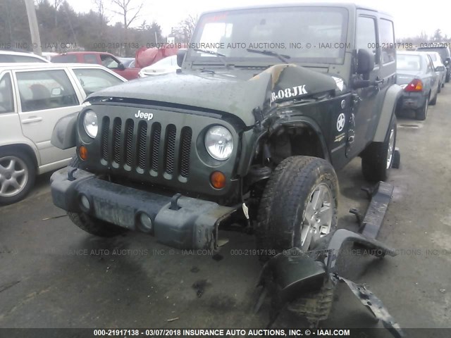 1J4FA54168L511885 - 2008 JEEP WRANGLER SAHARA GREEN photo 2