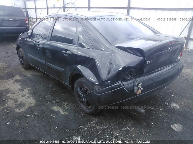 1FAFP33P84W173645 - 2004 FORD FOCUS LX BLACK photo 3