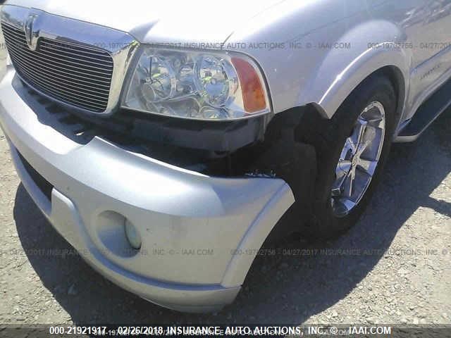5LMFU28RX4LJ31138 - 2004 LINCOLN NAVIGATOR SILVER photo 6