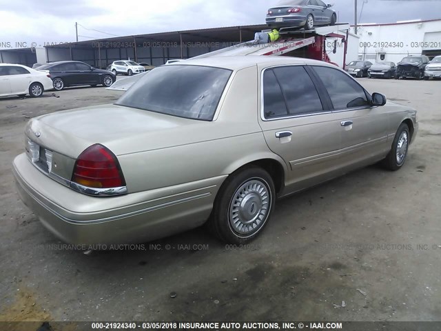 2FAFP73W5YX149960 - 2000 FORD CROWN VICTORIA  GOLD photo 4