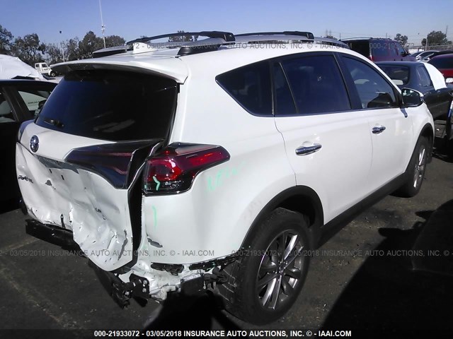 2T3YFREV1GW299868 - 2016 TOYOTA RAV4 LIMITED WHITE photo 4