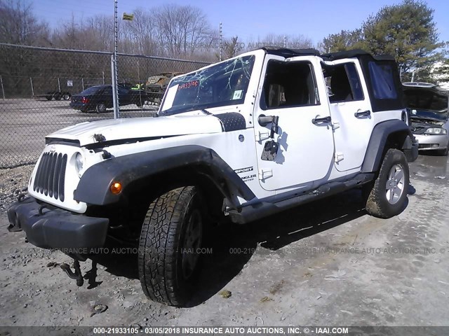 1C4BJWDG9DL658985 - 2013 JEEP WRANGLER UNLIMITE SPORT WHITE photo 2