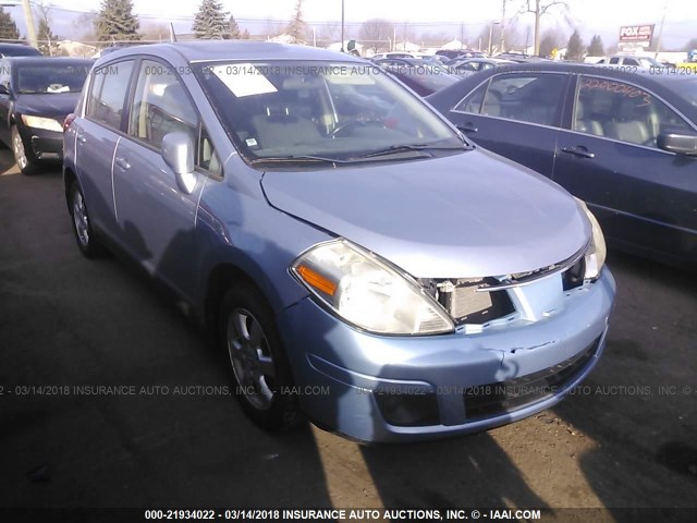 3N1BC13E79L406809 - 2009 NISSAN VERSA S/SL Light Blue photo 1