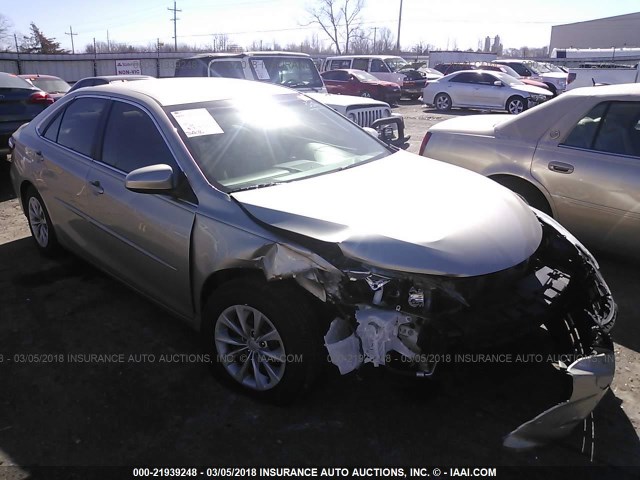 4T4BF1FK3FR447527 - 2015 TOYOTA CAMRY LE/XLE/SE/XSE GOLD photo 1