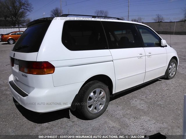 5FNRL180X4B106410 - 2004 HONDA ODYSSEY EXL თეთრი ფოტო 4