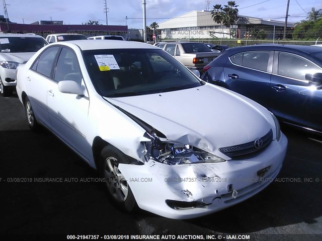 JTDBF32K530150634 - 2003 TOYOTA CAMRY LE/XLE WHITE photo 1