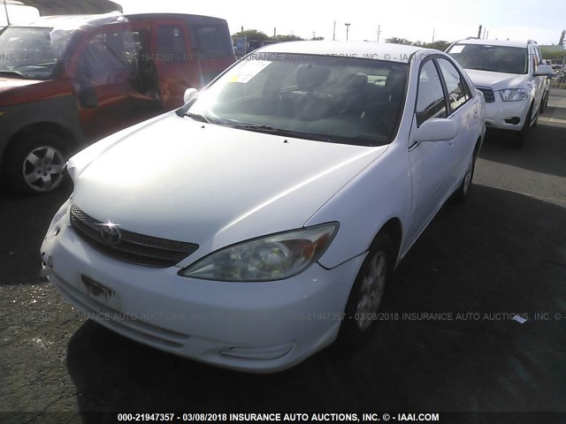 JTDBF32K530150634 - 2003 TOYOTA CAMRY LE/XLE Սպիտակ լուսանկար 2