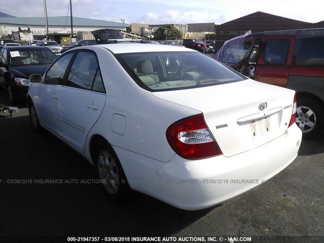 JTDBF32K530150634 - 2003 TOYOTA CAMRY LE/XLE Սպիտակ լուսանկար 3