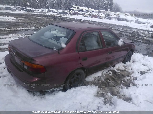 1Y1SK5285XZ416646 - 1999 CHEVROLET GEO PRIZM LSI RED photo 4