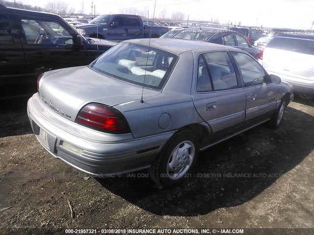 1G2NE55M0SC704057 - 1995 PONTIAC GRAND AM SE GRAY photo 4