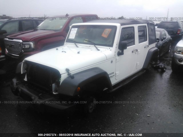 1C4BJWDG5DL641455 - 2013 JEEP WRANGLER UNLIMITE SPORT WHITE photo 2