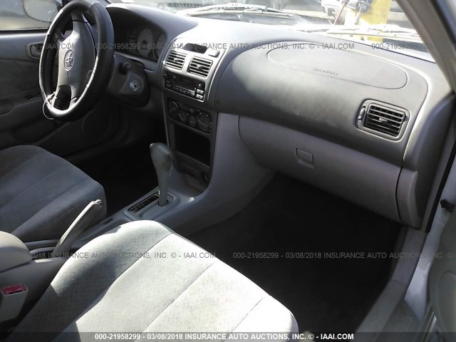 1NXBR12EXXZ265701 - 1999 TOYOTA COROLLA VE/CE/LE 银色 照片 5