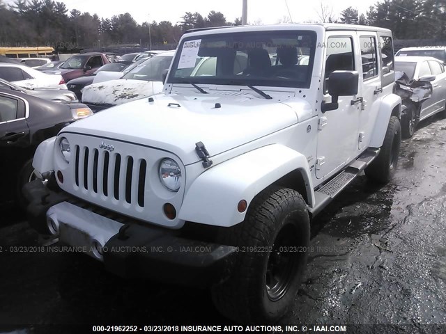 1C4BJWEG8CL227888 - 2012 JEEP WRANGLER UNLIMITE SAHARA WHITE photo 2