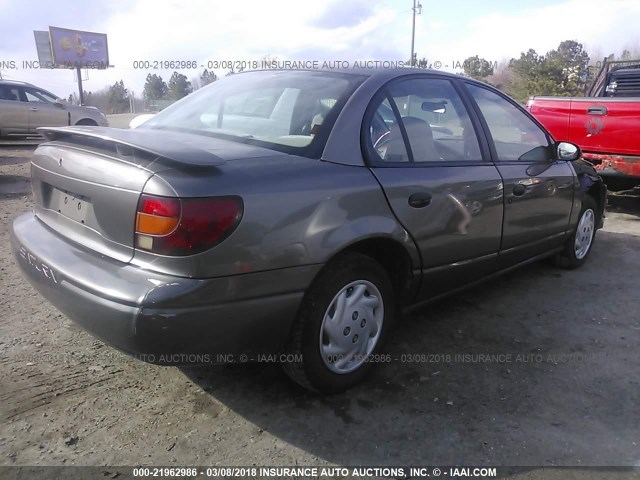 1G8ZH5280YZ228663 - 2000 SATURN SL1 GRAY photo 4