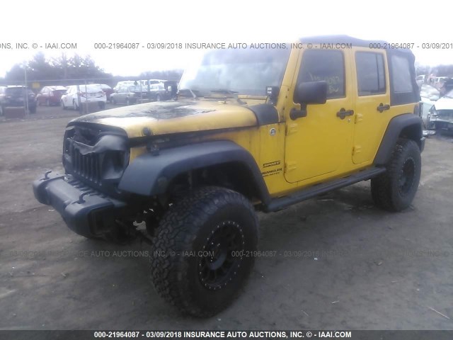 1C4BJWDG5FL592244 - 2015 JEEP WRANGLER UNLIMITE SPORT YELLOW photo 2