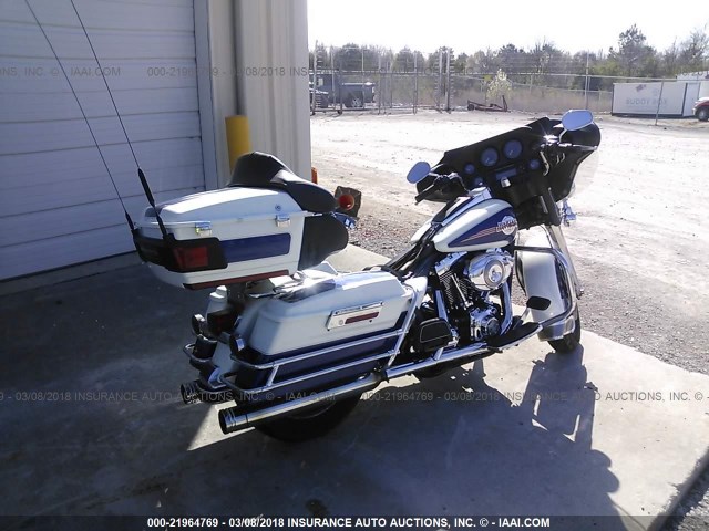 1HD1FC4147Y714327 - 2007 HARLEY-DAVIDSON FLHTCUI WHITE photo 4