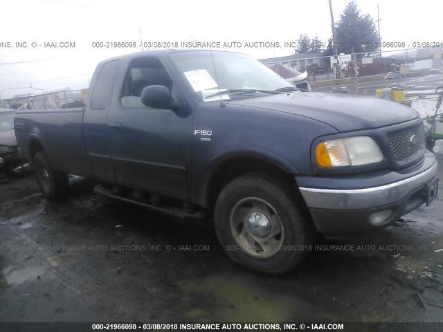 2FTRX18W6YCA20520 - 2000 FORD F150 BLUE photo 1