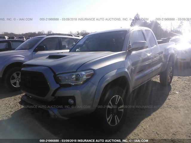 5TFSZ5AN2GX013159 - 2016 TOYOTA TACOMA ACCESS CAB/SR5/TRD SPT/OR SILVER photo 2