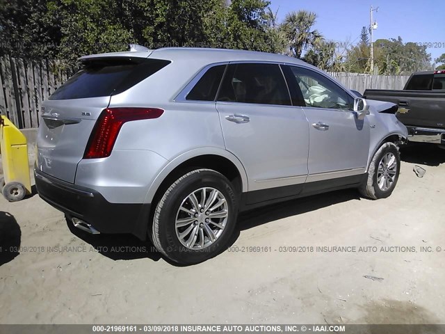 1GYKNCRS7JZ117694 - 2018 CADILLAC XT5 LUXURY SILVER photo 4